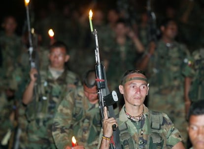 Paramilitaries from the AUC's Catatumbo unit seen here in 2004 before they turn over their arms and demobilize.
