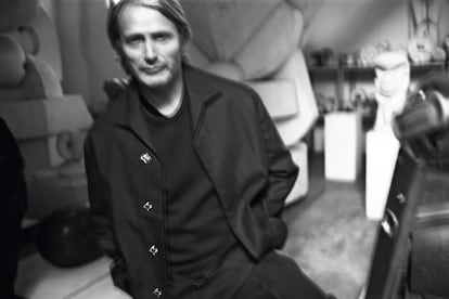 Mads Mikkelsen poses for ICON dressed in Zegna in the studio of sculptor Andrea Cascella.