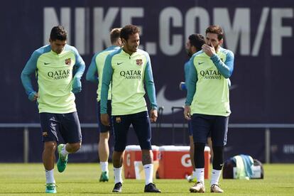 Neymar jr, Luis Suárez, y Leo Messi durante el entrenamiento.