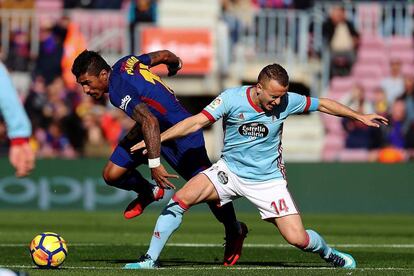 Paulinho disputa un balón con el jugador del Celta Lobotka.