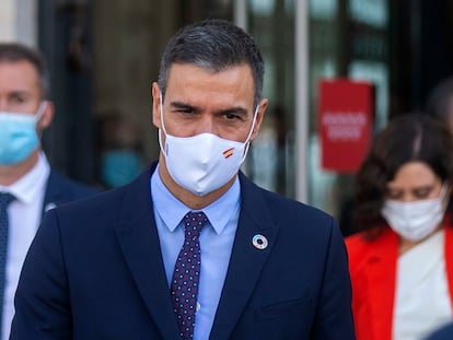 Spanish Prime Minister Pedro Sánchez  walking out of a meeting at Madrid regional headquarters.