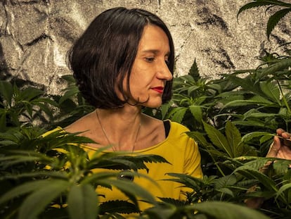 Carola Pérez, president of the Spanish Medicinal Cannabis Observatory cultivating at home.