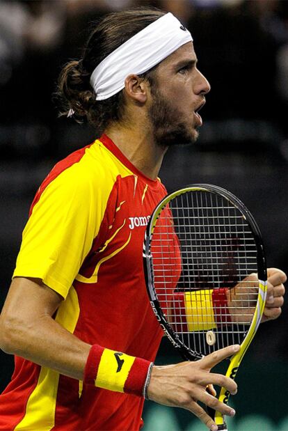 Feliciano López celebra un punto ante el estadounidense Mardy Fish.