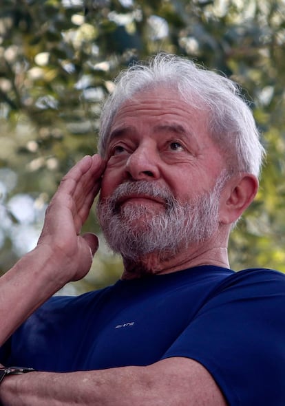 Brazilian ex-president (2003-2011) Luiz Inacio Lula da Silva gestures during a Catholic mass in memory of his late wife Marisa Leticia, at the metalworkers' union building in Sao Bernardo do Campo, in metropolitan Sao Paulo, Brazil, on April 7, 2018.
Brazil's election frontrunner and controversial leftist icon said Saturday that he will comply with an arrest warrant to start a 12-year sentence for corruption. "I will comply with their warrant," he told a crowd of supporters. / AFP PHOTO / Miguel SCHINCARIOL