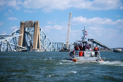 A Coast Guard boat carries senior officers to assess the Francis Scott Key Bridge collapse, in Baltimore, Maryland, U.S., on March 29, 2024.