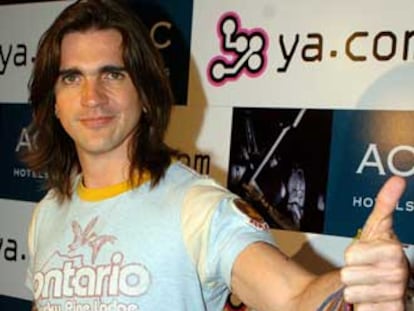 El cantautor colombiano Juanes posa durante la presentación de su gira <i>Mi sangre</i> hoy en Madrid.