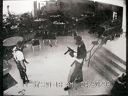 LITTLETON, CO - APRIL 20: (VIDEO CAPTURE) Columbine high school shooters Eric Harris (L) and Dylan Klebold appear in this video capture of a surveillance tape released by the Jefferson County Sheriff's Department in the cafeteria at Columbine High School April 20, 1999 in Littleton, CO during their shooting spree which killed 13 people.   (Photo courtesy of Jefferson County Sheriff's Department via Getty Images)