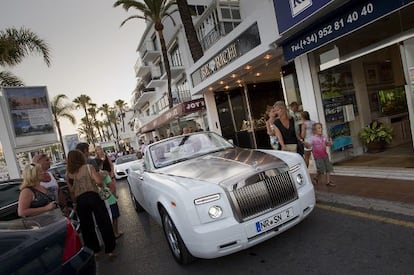 What crisis? A Rolls-Royce travels down the streets of Puerto Banús, Marbella.
