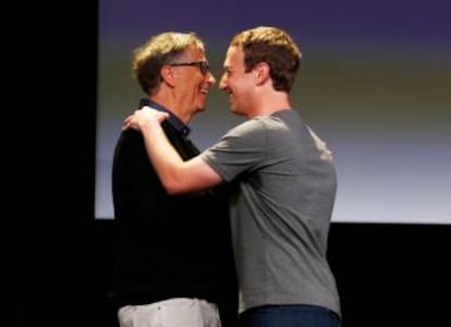 Gates hugs Mark Zuckerberg during the latter's announcement of an initiative to cure and prevent diseases last September.