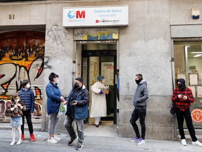 People wait in line to be tested for Covid-19 at a medical center in Madrid.