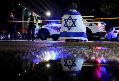A man looks on at the site where, according to the DHS Secretary, two Israeli embassy staff were shot dead near the Capital Jewish Museum in Washington, D.C.  