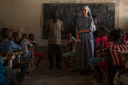 Sister Paësie, a French nun settled in the Cité Soleil neighborhood, where she has been helping families in extreme situations for 20 years.