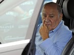 Founder and chairman of the Inditex fashion group Amancio Ortega sits in a car at the end of the 32nd edition of the A Coruna International Show Jumping competition at the Casas Novas Equestrian Centre in Arteixo, on July 31, 2016.  / AFP PHOTO / MIGUEL RIOPA
