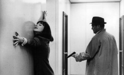 Eddie Constantine y Anna Karina en 'Alphaville' (1965), de Godard. 