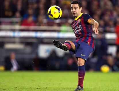 Xavi, durante el partido ante el Espanyol.