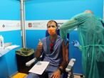 Fiumicino (Italy), 27/07/2021.- A medical worker receives a vaccination at the 'Vax & go' vaccination point at the 'Leonardo Da Vinci' airport in Fiumicino near Rome, Italy, 27 July 2021. Passengers will be able to receive the Covid-19 vaccine before leaving for their holidays. (Italia, Roma) EFE/EPA/Redazione Telenews