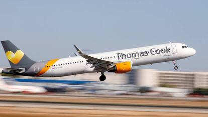 A Thomas Cook plane leaves Palma de Mallorca.