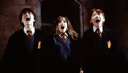 Harry Potter, Hermione Granger, i Ron Weasley a la primera entrega de la saga