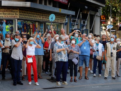 A group of tourists in Barcelona on Friday.