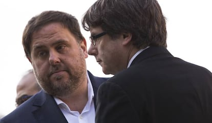 El presidente de la Generalitat, Carles Puigdemont, y el vicepresidente Oriol Junqueras.