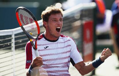 Pablo Carre&ntilde;o celebra la victoria ante Pablo Cuevas.