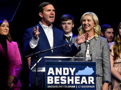 Kentucky Governor Andy Beshear with his wife, Britainy Beshear, in his acceptance speech after being re-elected to office on Tuesday in Louisville.