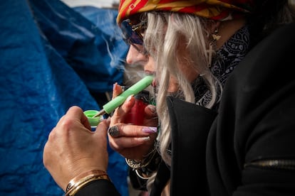 A woman smoking fentanyl in Los Angeles.