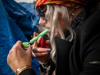 A woman smoking fentanyl in Los Angeles.