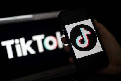 In this file photo taken on April 13, 2020 the social media application logo, TikTok is displayed on the screen of an iPhone in Arlington, Virginia.