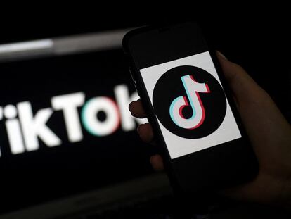 In this file photo taken on April 13, 2020 the social media application logo, TikTok is displayed on the screen of an iPhone in Arlington, Virginia.