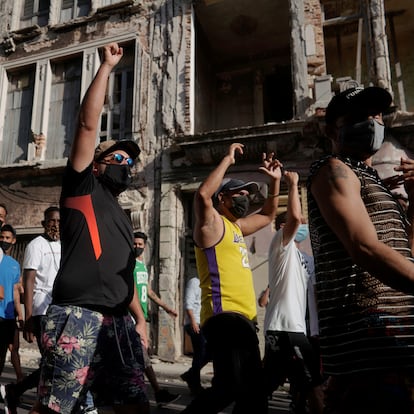 People shout slogans against the government during a protest against and in support of the government, amidst the coronavirus disease (COVID-19) outbreak, in Havana, Cuba July 11, 2021. REUTERS/Alexandre Meneghin