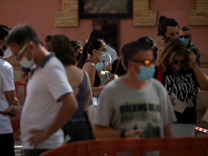 Members of the public wait for coronavirus tests in Villafranca del Panadés, Catalonia.