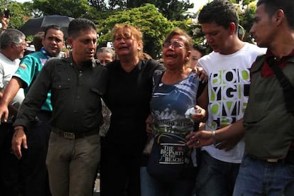 Family members attend the funeral of the 14-year-old who was shot dead by a police officer.