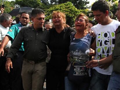 Family members attend the funeral of the 14-year-old who was shot dead by a police officer.