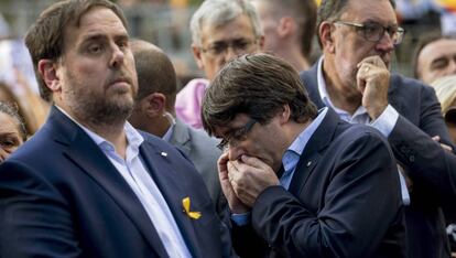 El presidente de la Generalitat, Carles Puigdemont, acompa&ntilde;ado del vicepresidente, Oriol Junqueras, en la manifestaci&oacute;n del pasado s&aacute;bado.