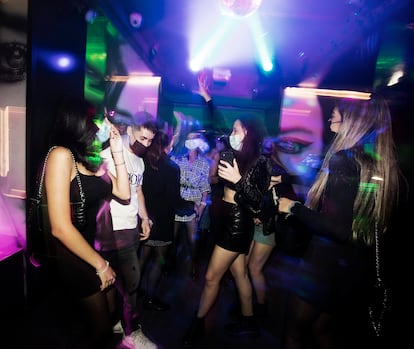 Young people dancing at a nighclub in Madrid on October 8.