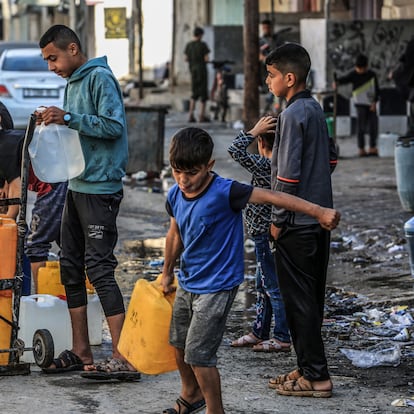 Children fill water jugs in Rafah, southern Gaza; April 17, 2024.