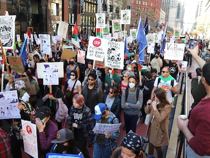 Protestors march toward Moscone Center where the APEC is being held, in San Francisco, California, 12 November 2023.