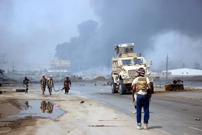 Yemeni government forces patrol an area taken by the Houthis.