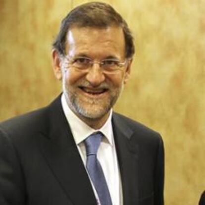 El presidente español, Mariano Rajoy, y la canciller Angela  Merkel en una foto de archivo.