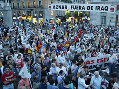 Un grupo de manifestantes, a su llegada a la Puerta del Sol, en Madrid.