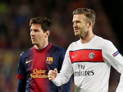 Lionel Messi y David Beckham en un partido de la Liga de Campeones en 2013.