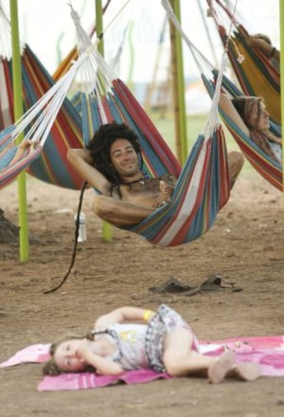 A festivalgoer at this year’s Rototom festival relaxes on a hammock.