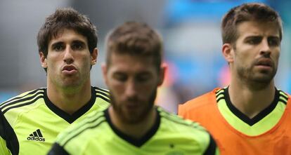 Javi Martínez, Sergio Ramos y Gerard Piqué.