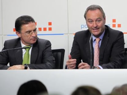 Castellano, Fabra y Ciscar, ayer en la reunión con altos cargos de la Generalitat en la sede del PP.