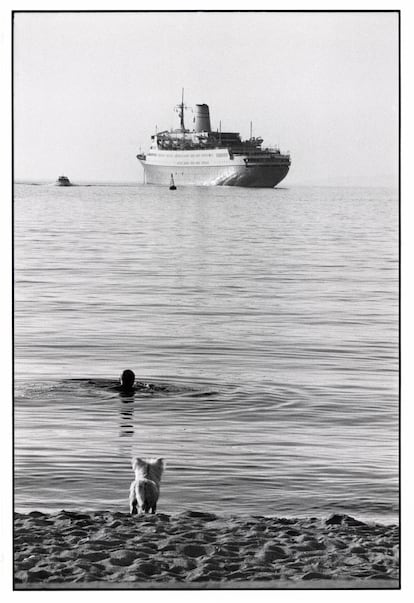 A bather enjoys solitude on a beach on the Greek island of Mykonos in 1976.