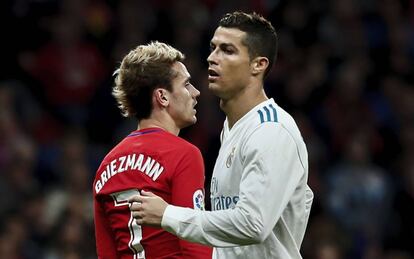 Griezmann y Cristiano, en el derbi.