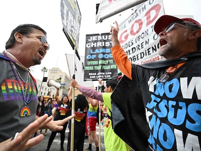 A man argues with an anti-gay religious protestor (R) at the 2023 LA Pride Parade on June 11, 2023 in Hollywood, California.