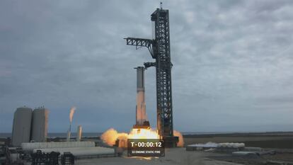 In this image from video made available by SpaceX, a Starship first-stage Super Heavy booster performs an engine-firing test at the launch pad in Boca Chica, Texas, on Thursday, Feb. 9, 2023.