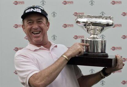 Miguel Angel Jimenez of Spain points out his own name on the trophy after winning the Hong Kong Open for a record-equaling fourth time. 